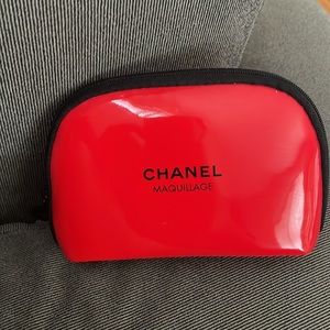 A cute small Chanel makeup bag.